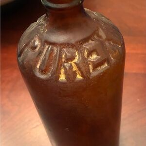 Vintage Brown Pure. Glass Amber Bottle